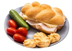 Snack with chicken ham, cheese, biscuits and vegetables