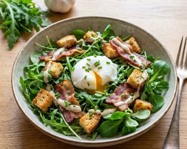 Salad with egg and bacon