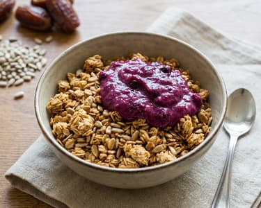 Granola with sunflower seeds and stewed fruit