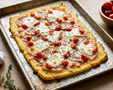 Polenta pizza on a baking sheet