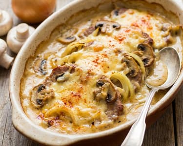 Baked pork neck with cheese and cream