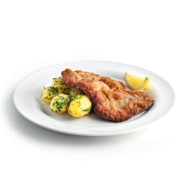 Zatloukaný řízek a petrželové brambory