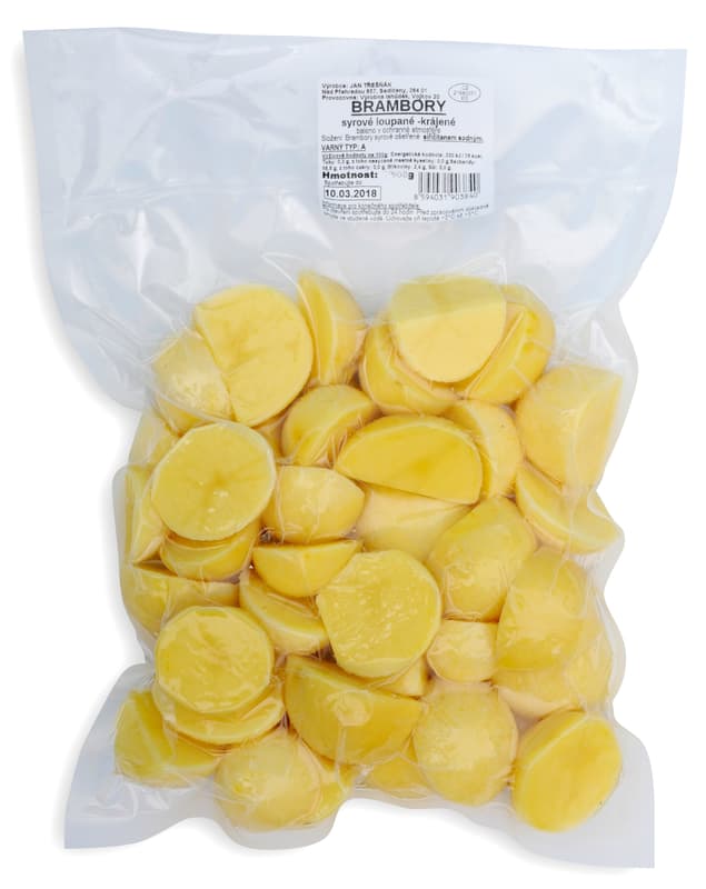 Peeled potatoes sliced