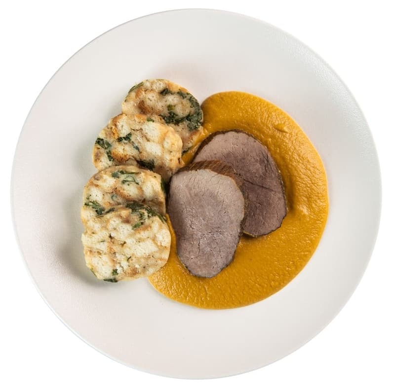 Beef with traditional root vegetable creamy sauce "Svíčková" Karslbath dumplings by Jan Bureš