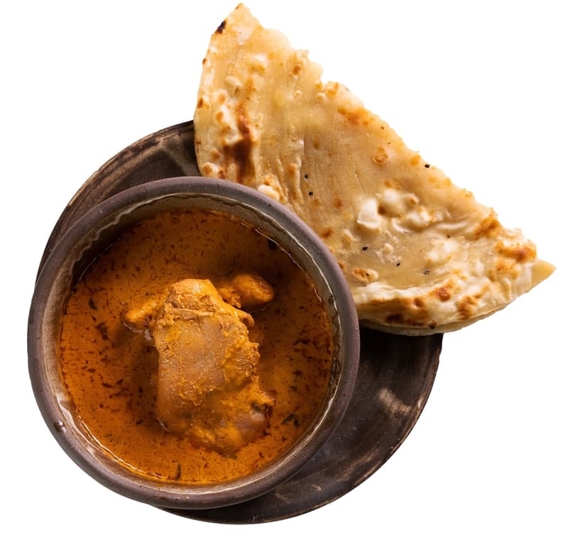 Butter Chicken with Naan Bread by Mahavir Kanswala