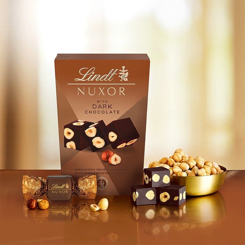 Lindt Bonboniéra Nuxor pralinky hořká čokoláda s celými lískovými ořechy