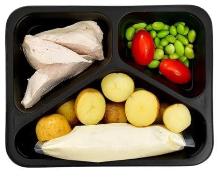 Chicken breast with cheese sauce and mini potatoes
