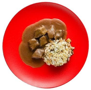 Beef stewed with garlic, cauliflower rice with bulgur, shiitake and mushrooms